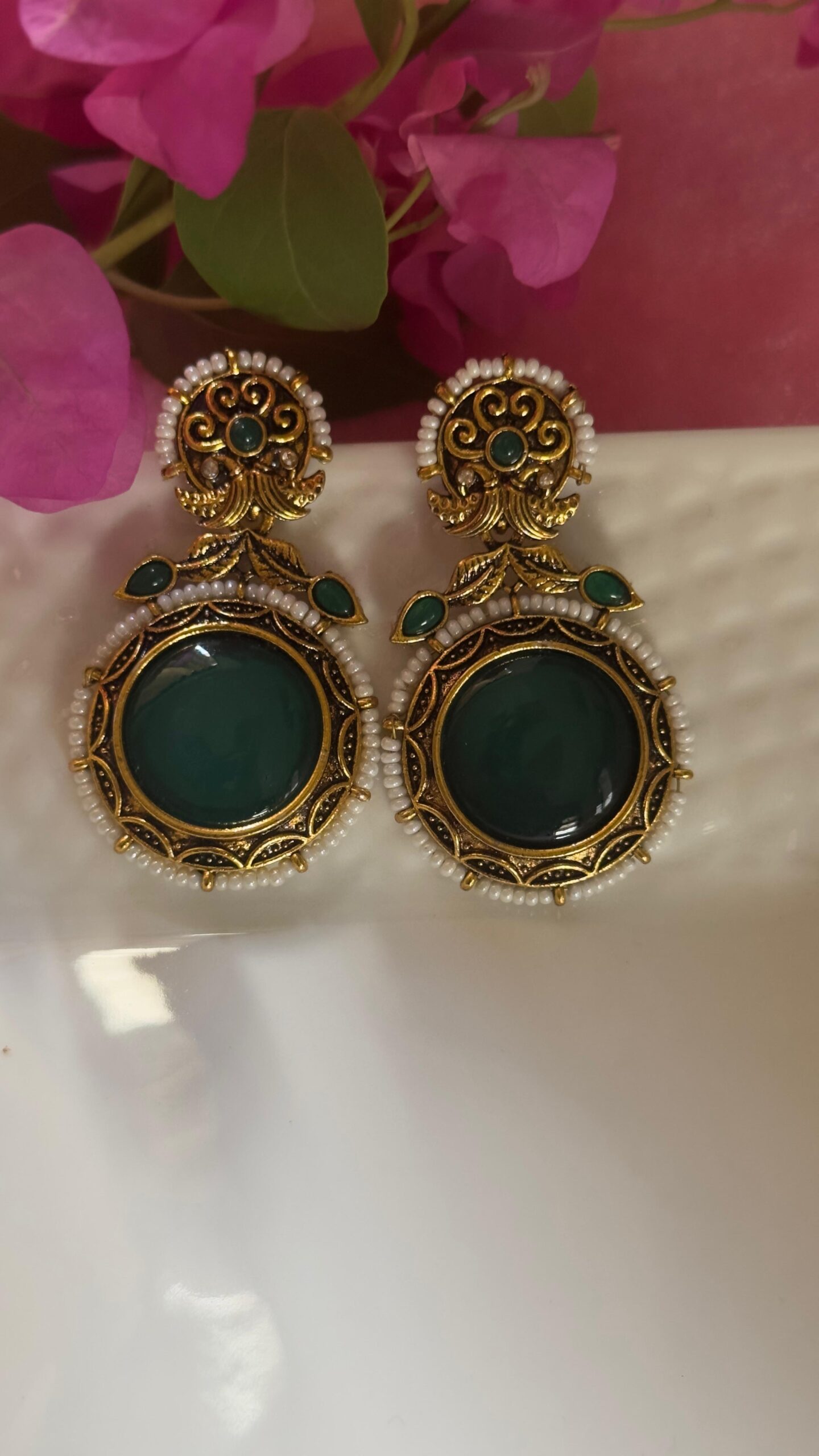 Emerald green  antique gold tone earrings.