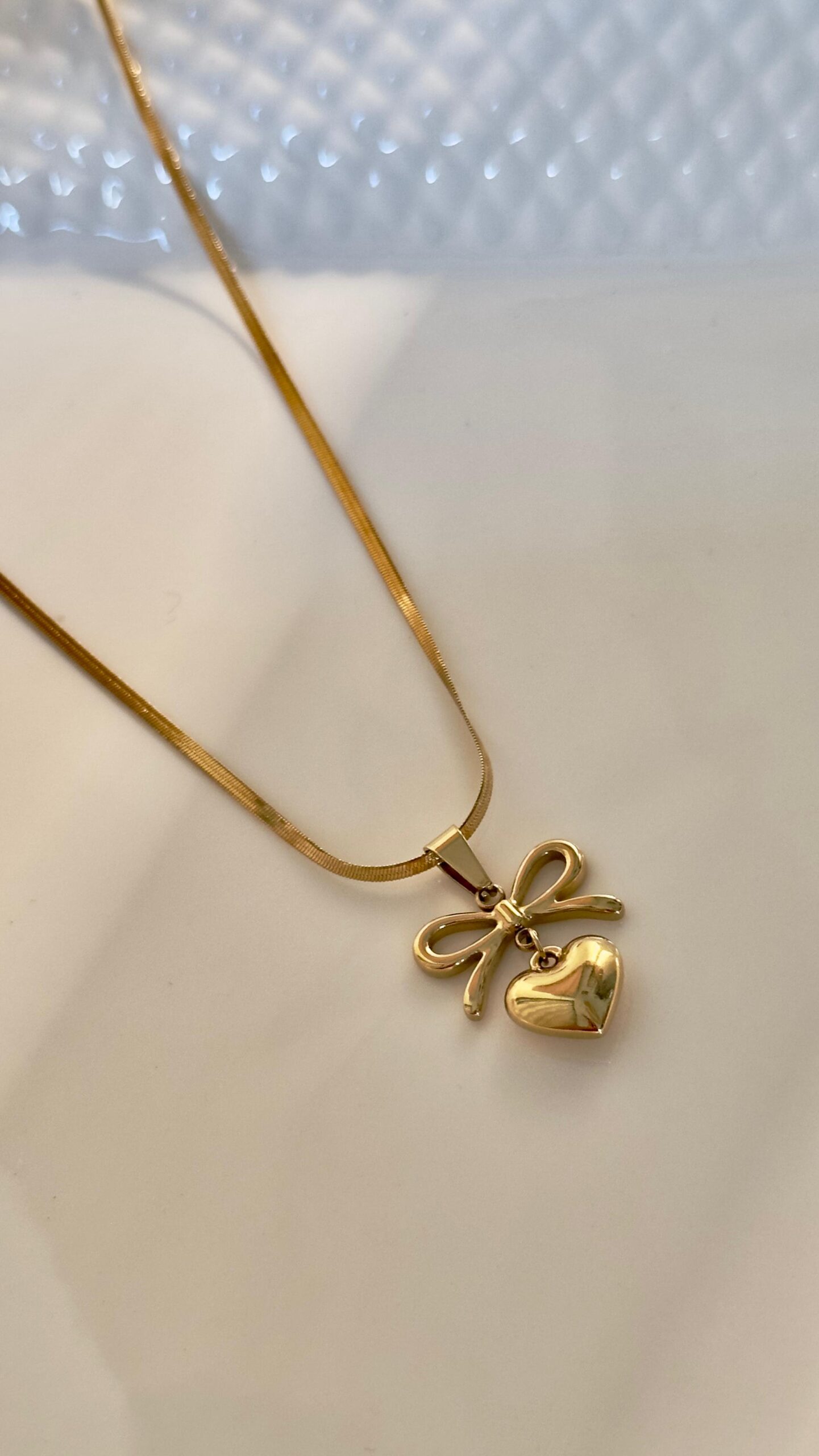 Gold Bow Heart Pendant Necklace