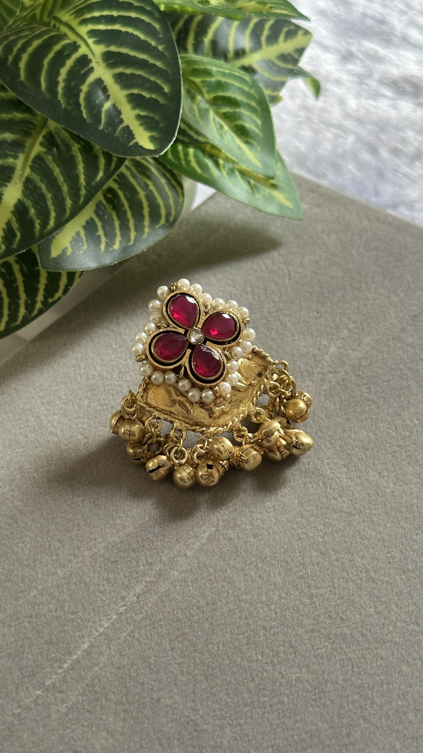 Traditional Statement Red Ring.
 Design: A floral-shaped