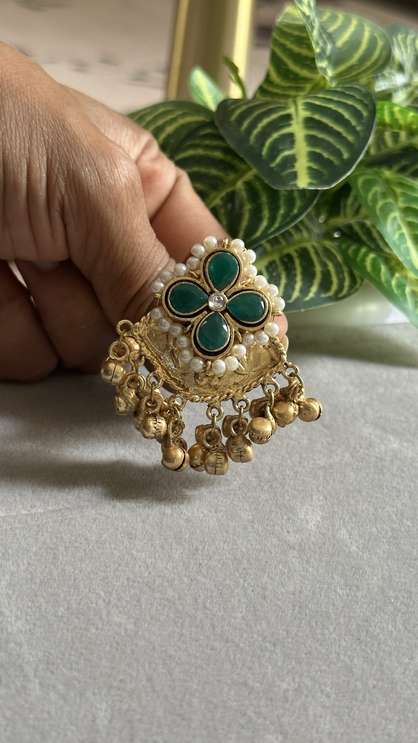 Traditional Statement Green Ring
 Design: A floral-